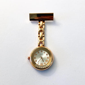 Bejwelled gold metal nurse watch